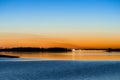 Comet Panstarrs Sunset across a lake Royalty Free Stock Photo