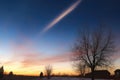 comet streaking through the evening sky Royalty Free Stock Photo