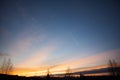 comets streaking through the sky at dusk