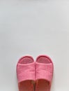 Comfort concept: a pair of indoor pink sandals Royalty Free Stock Photo