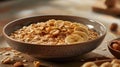 Comfort food dish oatmeal with bananas peanuts on a table