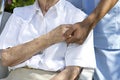 Comfort and Support from a care giver towards the Elderly Royalty Free Stock Photo