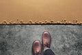 Comfort Zone Concept, Male with Leather Shoes Steps from Cement Royalty Free Stock Photo