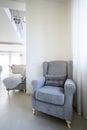 Comfortable armchair standing in the corner Royalty Free Stock Photo