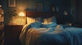 Comfortable bed in tranquil room, morning glow, restful atmosphere Royalty Free Stock Photo