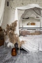 Comfortable bedroom interior in bohemian style