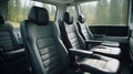 Comfortable black leather seats in a spacious van set against a forest backdrop. Generative AI Royalty Free Stock Photo