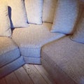 Comfortable corner sofa with lots of cushions Royalty Free Stock Photo