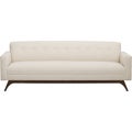 Comfortable Cream colour studded back luxury sofa with white background - Stock image Royalty Free Stock Photo