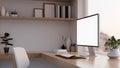 Comfortable home office workspace interior with computer mockup, wood built-in shelves Royalty Free Stock Photo