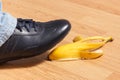 Leather shoe before slipping on banana peel Royalty Free Stock Photo