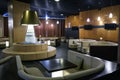 Comfortable lounge zone in luxury interior in hotel lobby or restaraunt with sofas and tables