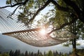 Comfortable net hammock outdoors on sunny day Royalty Free Stock Photo