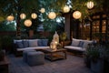 comfortable patio seating area with lit lanterns