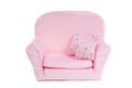 Comfortable Pink armchair with two pillows on it