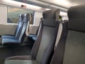 Comfortable seats and view through window in modern train Royalty Free Stock Photo