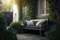 comfortable summer bench with cushions in courtyard of three-storey house snugly hidden in bushes cozy backyard