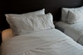 Comfortable twin beds with contemporary bedding Royalty Free Stock Photo