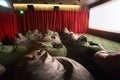 Comfortable unusual seats and screen in movie theater Royalty Free Stock Photo