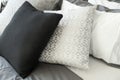 Comfortable white and grey pillow on bed Royalty Free Stock Photo