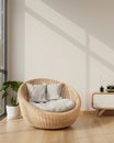 A comfortable wicker armchair lounge on a parquet floor in a cosy minimalist bright living room Royalty Free Stock Photo