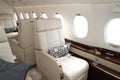 Comfortible chairs in a modern business jet aircraft