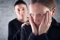 Comforting friend. Woman consoling her sad friend. Royalty Free Stock Photo