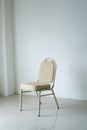 comfotable chair in empty white room. Empty chair at the room corner. loneliness concept Royalty Free Stock Photo