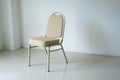 comfotable chair in empty white room. Empty chair at the room corner. loneliness concept Royalty Free Stock Photo