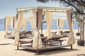 Comfotable chaise with canopy on vip beach Royalty Free Stock Photo