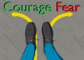 Boots on Courage and fear text with arrows.