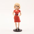 Elegant Blonde Girl Figurine In Patrick Brown Style Royalty Free Stock Photo
