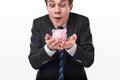 Comic businessman with piggy bank Royalty Free Stock Photo