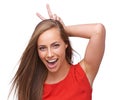 Comic, funny and bunny ears portrait of woman with happy, joyful and cheerful smile in studio. Happiness, crazy and Royalty Free Stock Photo