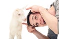 The comic image of a young man butts a little goat Royalty Free Stock Photo