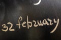 32 february Handwritten With Chalk On A Blackboard