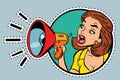 Comic woman agitator shouts into a megaphone Royalty Free Stock Photo