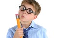 Comical boy holding a pencil and thinking Royalty Free Stock Photo