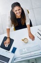 Coming for that number one spot. High angle portrait of an attractive young businesswoman working at her desk in the Royalty Free Stock Photo