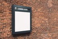 Coming soon blank white outdoor signage on red brick wall