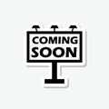 Coming Soon on a large outdoor billboard sticker isolated on gray background Royalty Free Stock Photo