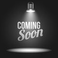 Coming soon message illuminated with light Royalty Free Stock Photo