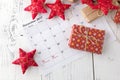 Coming xmas day. Highlighting christmas date on calendar with gift box