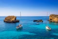 Comino, Malta - Sailing boats at the beautiful Blue Lagoon at Comino Island