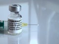 Macro of Comirnaty Biontech vaccination ampoule with a syringe against Covid-19 or Corona virus Royalty Free Stock Photo