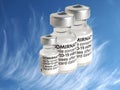 Macro of Comirnaty Biontech Pfizer vaccination ampoules against Covid-19 or Corona virus with sky background