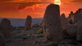 Commagene statues on the summit of Mount Nemrut during sunset in Adiyaman, Turkey Royalty Free Stock Photo