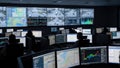 Command Center with Multiple Screens Monitoring Data and Surveillance Feeds Royalty Free Stock Photo