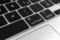 Command key and button on apple keyboard. Command sign close-up. Modern laptop, communication concept photo