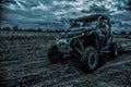 Army rangers moving on military buggy at night Royalty Free Stock Photo